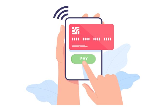 Hand holding phone with credit card on screen online payments