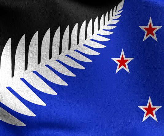 Lockwood silver fern, New Zealand national flag blowing in the wind.