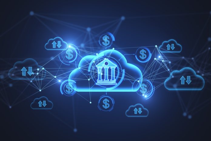 Abstract glowing blue cloud computing and online banking hologram with various icons on blurry background. Database, finance, technology and future concept. 3D Rendering. Cloud Core Banking: