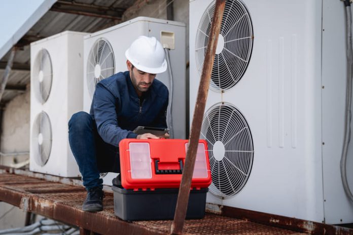 lone worker home visitation to check the air condition