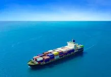 Aerial view of the freight shipping transport system cargo ship container.