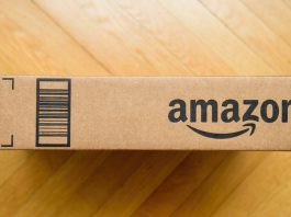 Amazon prime cardboard carton package on the wooden floor