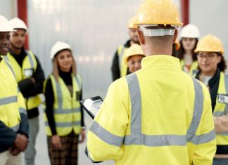 leader training the employees on safety strategy in the workplace