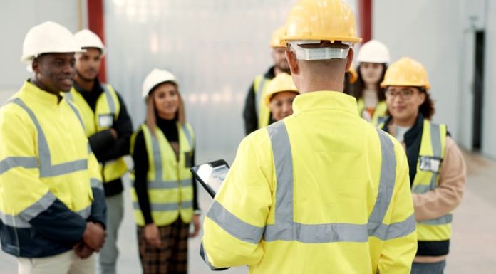 The Hidden Cost of Reactive Leadership and Why Businesses are Reframing Safety as a Strategic Priority leader training the employees on safety strategy in the workplace