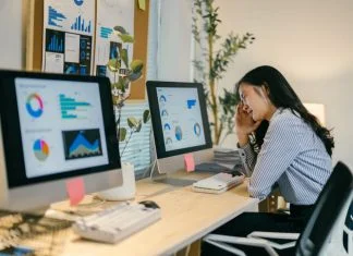 Why Full Stack Observability Tools Fail — And How the Right Process Fixes It woman problematic after Full Stack Observability Tools Fail