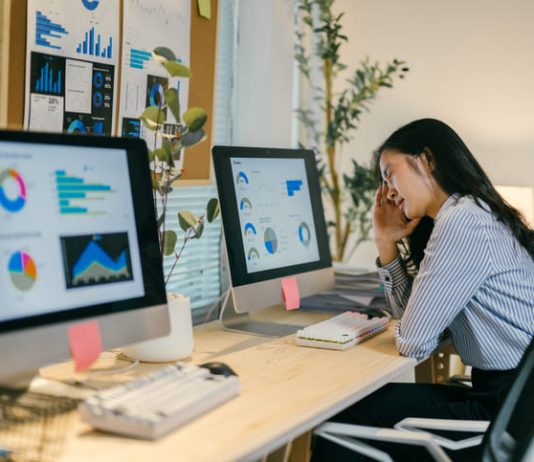 Why Full Stack Observability Tools Fail — And How the Right Process Fixes It woman problematic after Full Stack Observability Tools Fail