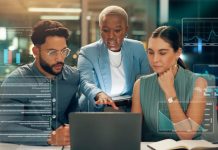 Harnessing Analytics to Drive Strategic Business Decisions Business people discussing business analytics