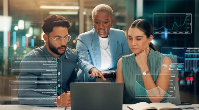 Harnessing Analytics to Drive Strategic Business Decisions Business people discussing business analytics