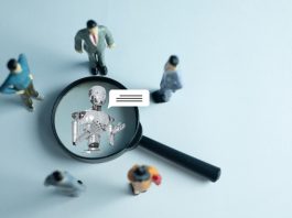 The interaction between humans and AI. Miniature figures represent a team or customers engaging with a robot virtual assistant, symbolizing the future of communication and technology.