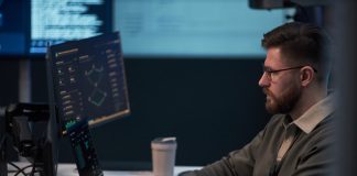Building Products that Stay Stable After Launch: A QA and DevOps Perspective by Softalium Limited DevOps of Softalium Limited working in the office