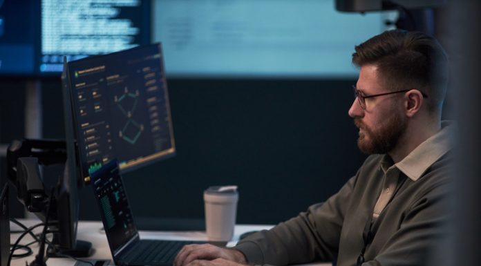 Building Products that Stay Stable After Launch: A QA and DevOps Perspective by Softalium Limited DevOps of Softalium Limited working in the office