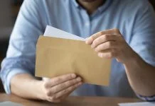 Banking on Delivery: The 13 Best Direct Mail API Platforms Ranked for Financial Institutions in 2026 Person received a Direct Mail from the bank