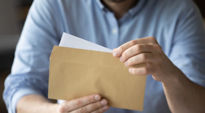 Banking on Delivery: The 13 Best Direct Mail API Platforms Ranked for Financial Institutions in 2026 Person received a Direct Mail from the bank