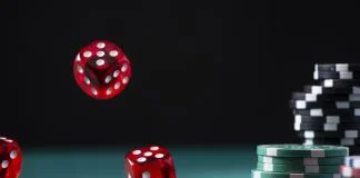 What Makes Finland One of Europe’s Most Interesting iGaming Markets? iGaming Markets - Casino Chips Stack and Flying Dices on Green Poker Table.