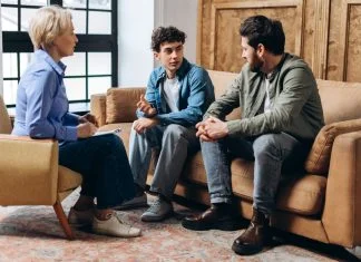 How Parents Can Help Teenagers Navigate Online Language and Peer Pressure How Parents Can Help - Father and teenage son talking