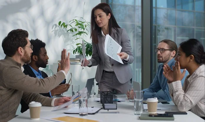 Multinational business team office businesswomen African businessmen argue angry leader Caucasian woman director boss shouting scream scold workers employers documents fail paperwork problem conflict leadership