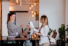 From Beds to Belonging: How Social-First Hospitality is Changing Travel modern traveler trying Social-First Hospitality hotel for her accommodation