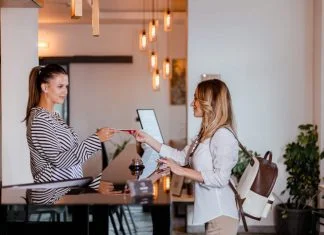 From Beds to Belonging: How Social-First Hospitality is Changing Travel modern traveler trying Social-First Hospitality hotel for her accommodation