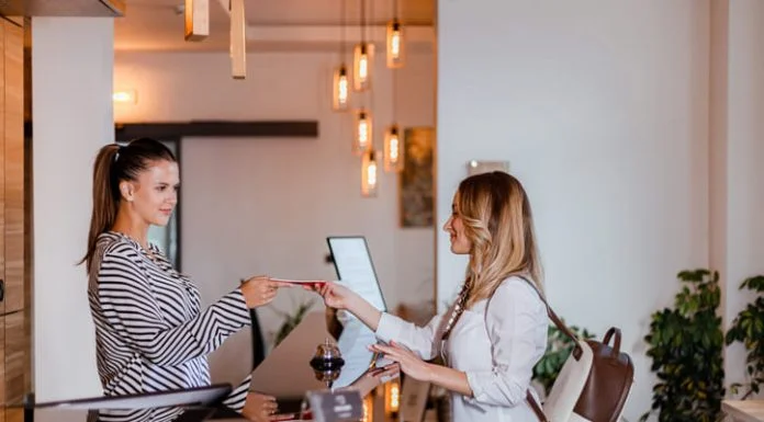 From Beds to Belonging: How Social-First Hospitality is Changing Travel modern traveler trying Social-First Hospitality hotel for her accommodation