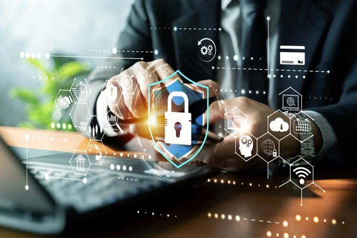 Cybersecurity Shield and Data Protection Concept with Businessman Using Smartphone cyber security