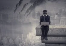 Most Companies Aren’t Built to Care About Impact Male worker working on the rooftop while using laptop computer and wear a gas mask with air pollution in the city, Companies operating despite the negative impact on society concept.