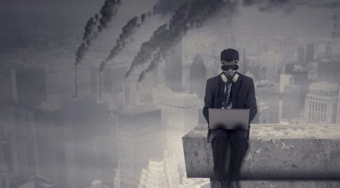 Most Companies Aren’t Built to Care About Impact Male worker working on the rooftop while using laptop computer and wear a gas mask with air pollution in the city, Companies operating despite the negative impact on society concept.