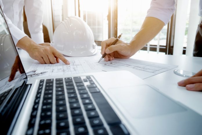 Engineer meeting for architectural project. working with partner commercial landlords