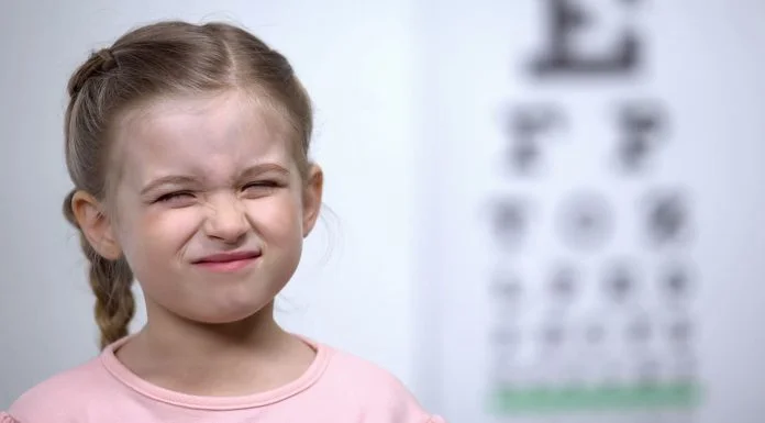 Neurodivergent British Children - Small girl frowning