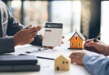 Why Financial Guidance Matters Before Buying Your Next Investment Property Financial Guidance Matters - House model with agent