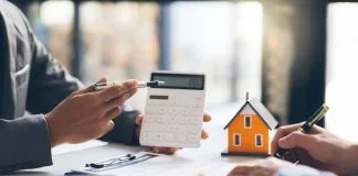 Why Financial Guidance Matters Before Buying Your Next Investment Property Financial Guidance Matters - House model with agent