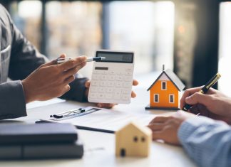 Why Financial Guidance Matters Before Buying Your Next Investment Property Financial Guidance Matters - House model with agent