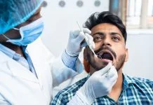 Dental Luting Cement - Close up shot of dentist