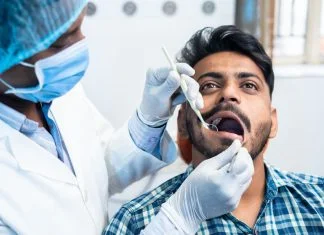 How Should a Dental Luting Cement Be Selected? Dental Luting Cement - Close up shot of dentist