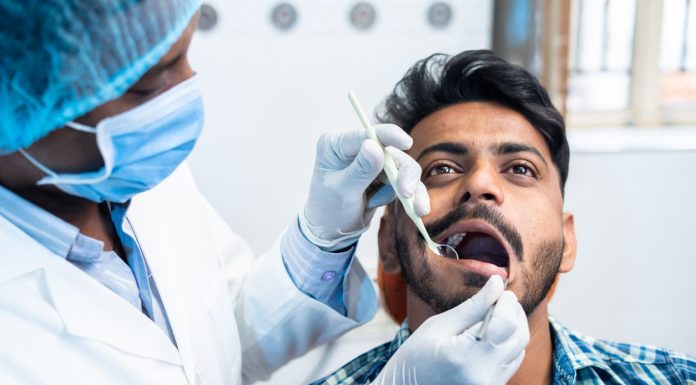 Dental Luting Cement - Close up shot of dentist