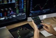 How Charting Tools are Reshaping Retail Trading Businessman checking stock market data. Retail Trading concept