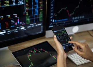 How Charting Tools are Reshaping Retail Trading Businessman checking stock market data. Retail Trading concept
