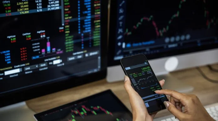 How Charting Tools are Reshaping Retail Trading Businessman checking stock market data. Retail Trading concept