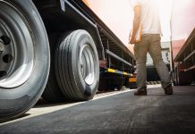 Why A Reliable Heavy Duty Trailer and Truck Bed Manufacturer Matters for Your Fleet Reliable Heavy Duty Trailer - Trailer Truck on Parking Lot