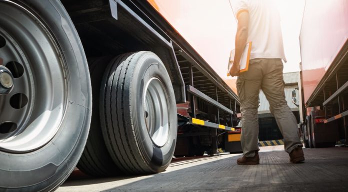 Why A Reliable Heavy Duty Trailer and Truck Bed Manufacturer Matters for Your Fleet Reliable Heavy Duty Trailer - Trailer Truck on Parking Lot
