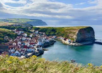 Paul Smith: From Yorkshire to an International Legacy An elevated view of Staithes, an historic traditional British fishing village in North Yorkshire, England.