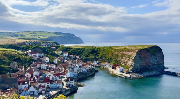 Paul Smith: From Yorkshire to an International Legacy An elevated view of Staithes, an historic traditional British fishing village in North Yorkshire, England.