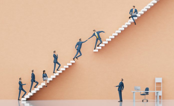 Businessman jumping between platforms in order to get the better professional position