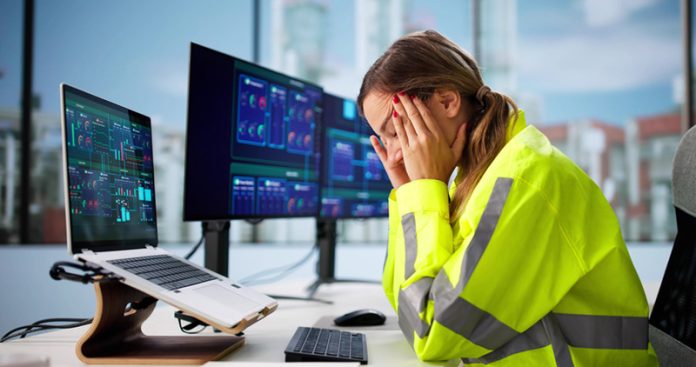 Exhausted Young Woman Checks Control Panel Most Stressful Industries