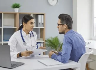 Healthcare Providers with her patient during consultation