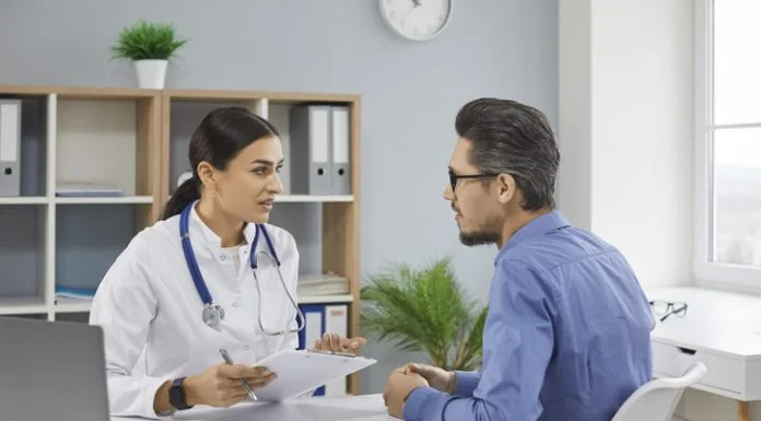 Healthcare Providers with her patient during consultation