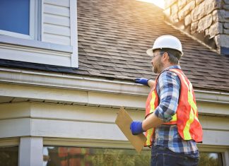 How Roof Design Shapes the Look and Value of Your Home How Roof Design Shapes Home Value - inspecting house roof