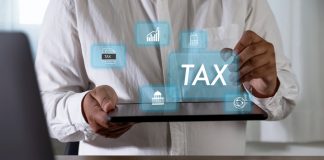 SAF-T vs. Traditional Tax Reporting: What are the Key Differences? Tax filing completed concept TAX dashboard , symbolizing online tax return approval, e-filing services, compliance checks, and financial reporting.