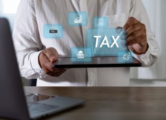 SAF-T vs. Traditional Tax Reporting: What are the Key Differences? Tax filing completed concept TAX dashboard , symbolizing online tax return approval, e-filing services, compliance checks, and financial reporting.