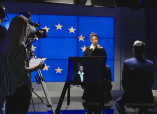 European Media Marketplace - Female news anchor