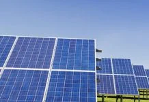 Powering Two Futures: How the UAE Is Building an Energy Portfolio for Tomorrow UAE Energy Strategy - blue solar panel boards